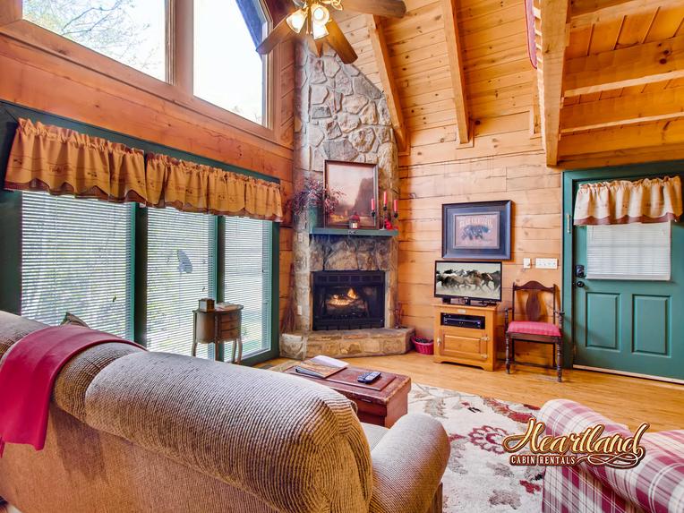 Living area with flat screen TV and fireplace